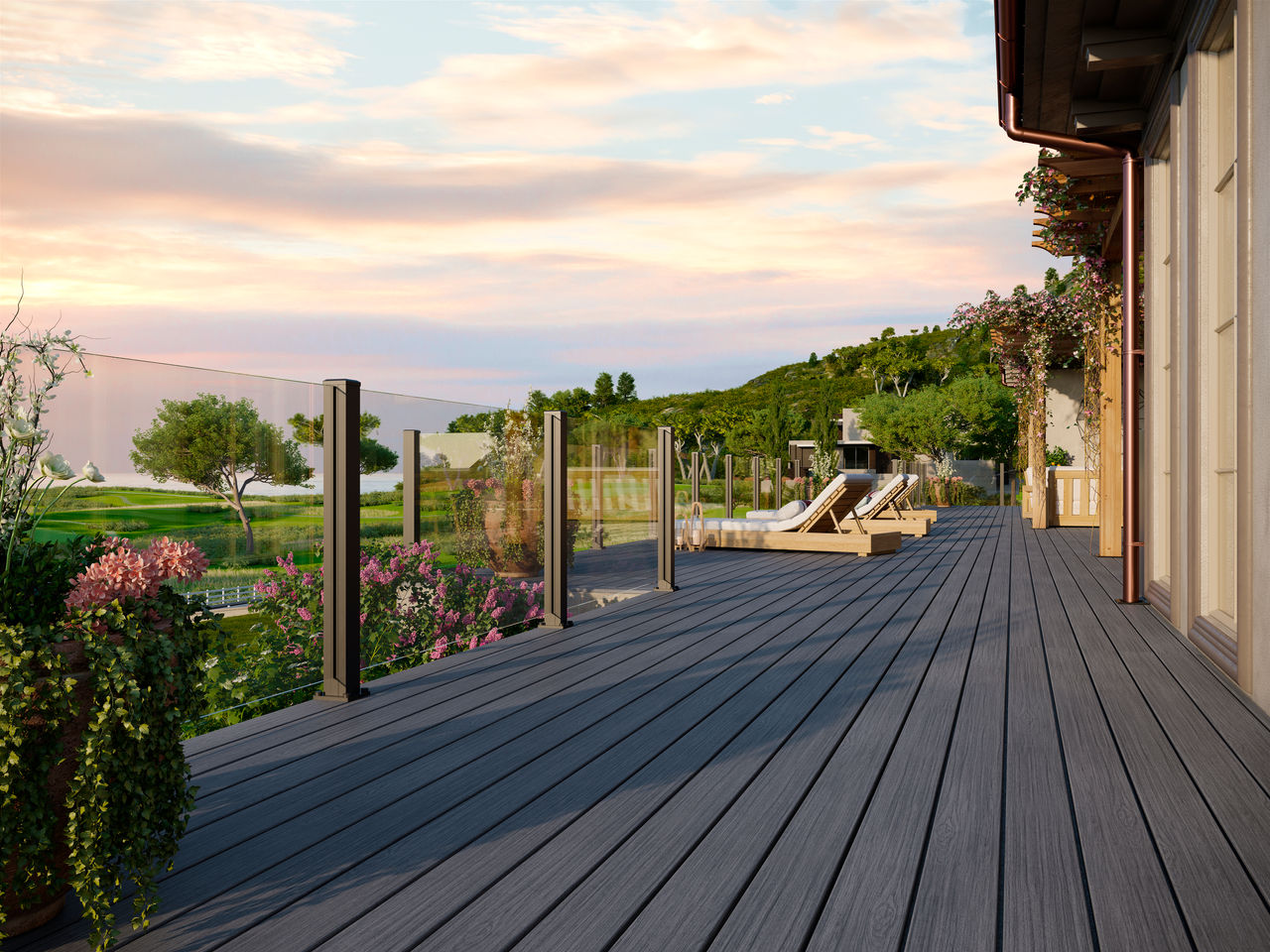 sig-x-series-001-railing-frameless-sig-decking-whidbey-pebble-beach-golf-horizontal-BKAXGLIX.jpg Trex frameless glass rail on a composite Trex deck overlooking a beautiful lawn at sunset.